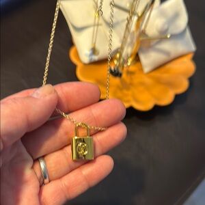 Gold Padlock Pendant Necklace LV Authentic bag charm on adjustable necklace.